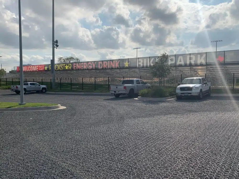 A parking lot with cars parked in it.