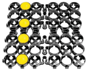 A black and white photo of many circles with one yellow dot.